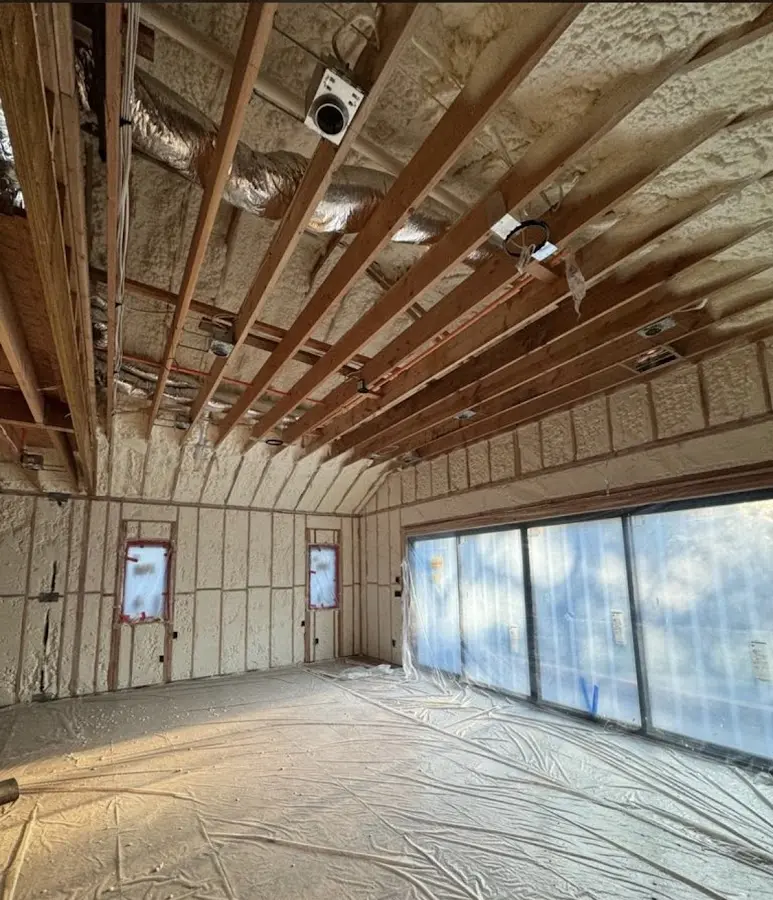 Interior walls and ceiling insulated with spray foam during new construction in Hamtramck