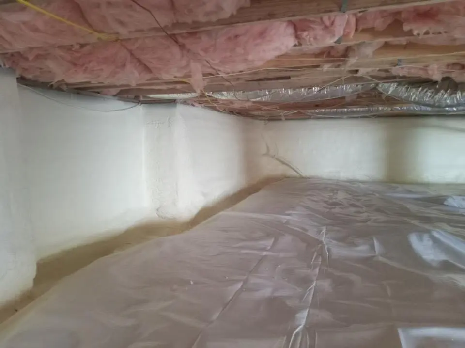 Crawl space encapsulation with closed-cell spray foam for Storm Damage Roof Repair in Hamtramck